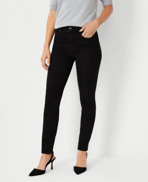 Petite Mid Rise Skinny Jeans in Jet Black Wash